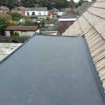 Laying out rubber on roof dormer